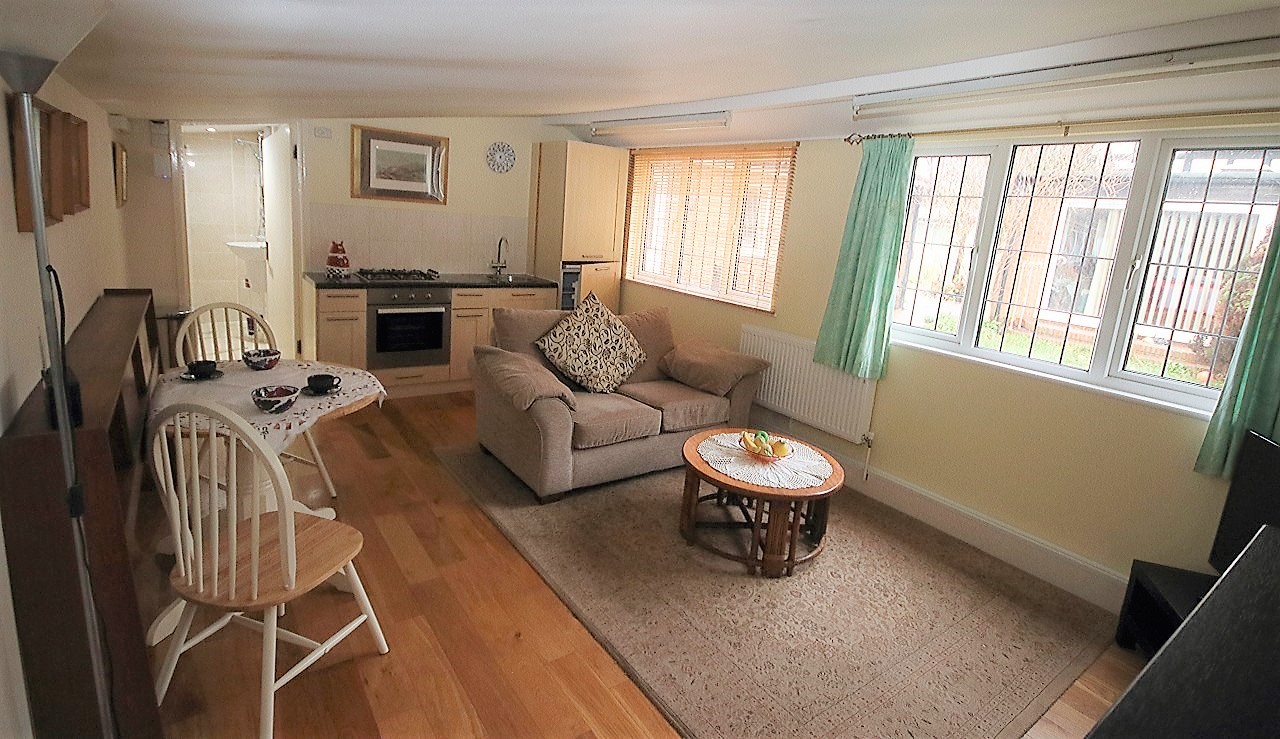 Large one double bedroom fully furnished garden flat to let in